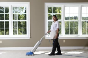 A Busy Bee house cleaner vacuuming and providing routine cleaning services Kennett Square, PA.